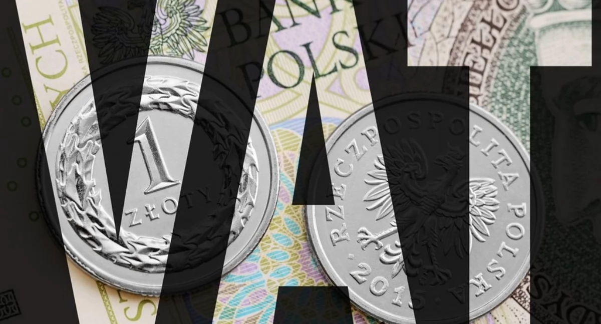 Zdjęcie banknotów i napisu VAT/ KAS
